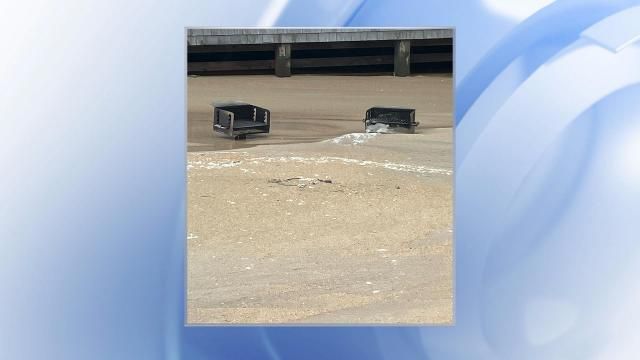 Grills buried in sand at Hatteras Motel