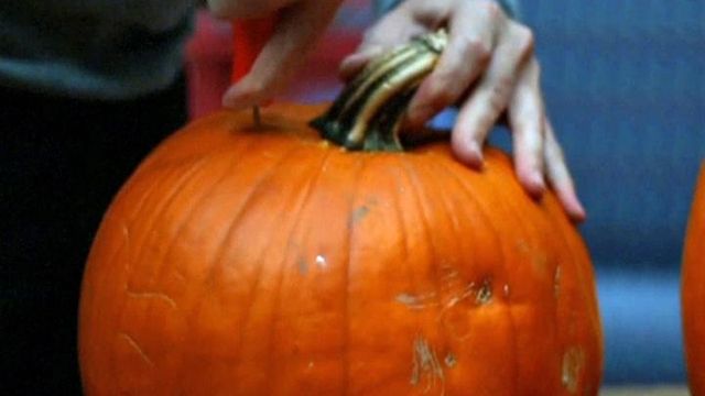 Why do we carve pumpkins for Halloween? 