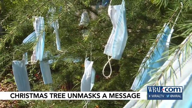 Health care worker uses masks as Christmas tree décor