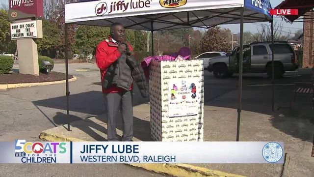 At Jiffy Lube, donations pile up for Coats for the Children