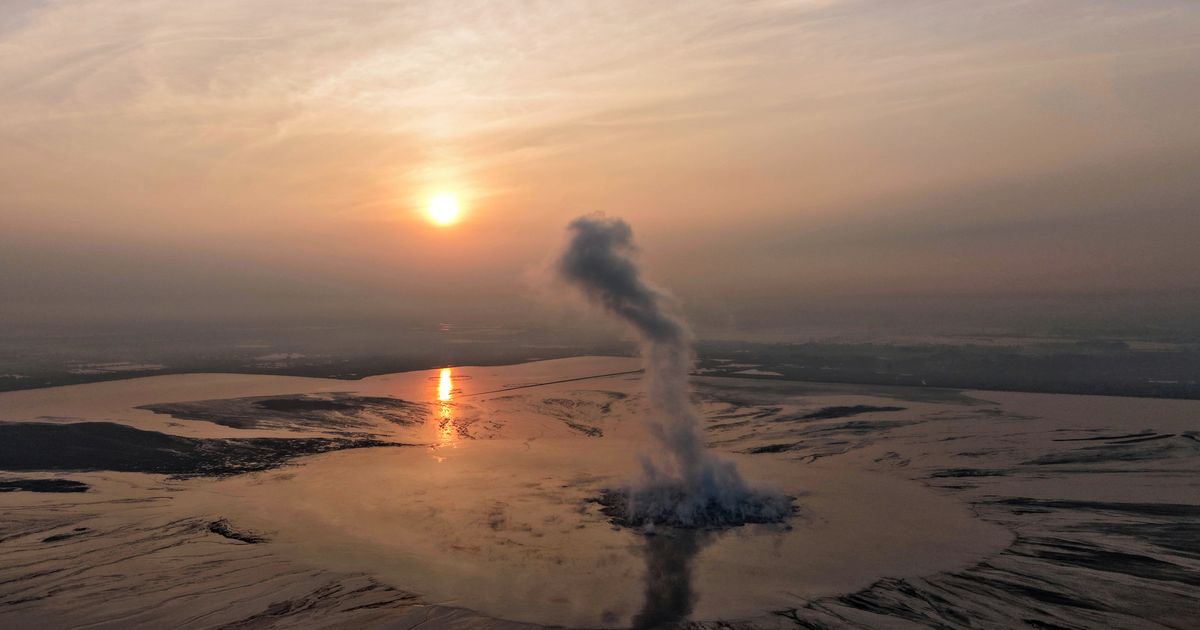 Indonesians mark 20 years since mud volcano eruption swallowed up entire communities in East Java