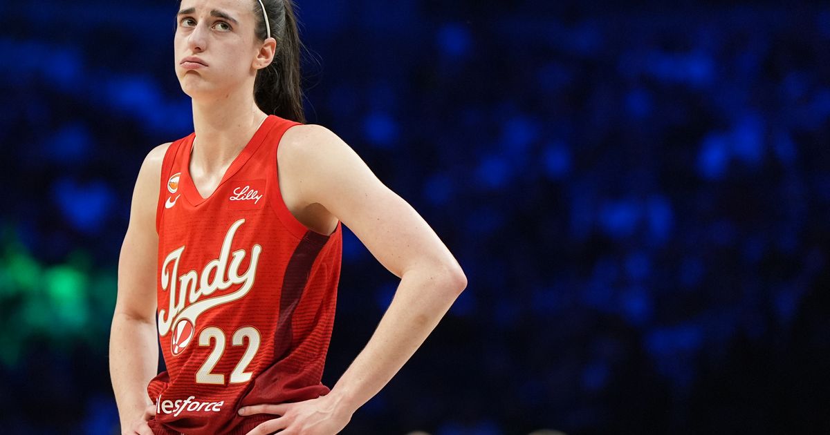 Indiana Fever guard Caitlin Clark reacts during the second half of a WNBA basketball game against the Minnesota Lynx