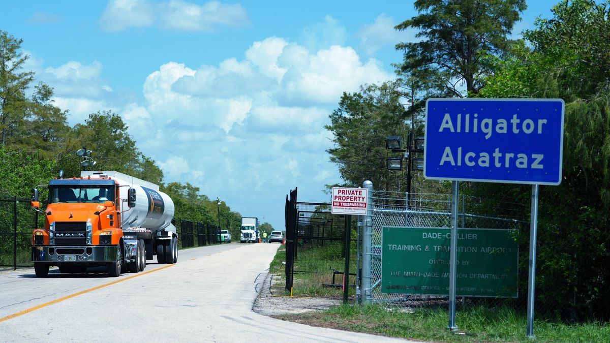 FILE - Trucks come and go from the "Alligator Alcatraz" immigration detention center in the Florida Everglades, Thursday, Aug. 28, 2025, in Collier County, Fla. (AP Photo/Rebecca Blackwell, File)