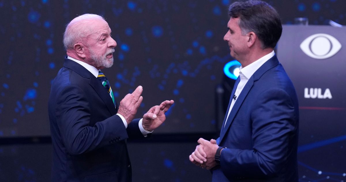 Brazil's Lula and Flávio Bolsonaro trade barbs in 1st debate only days before presidential runoff