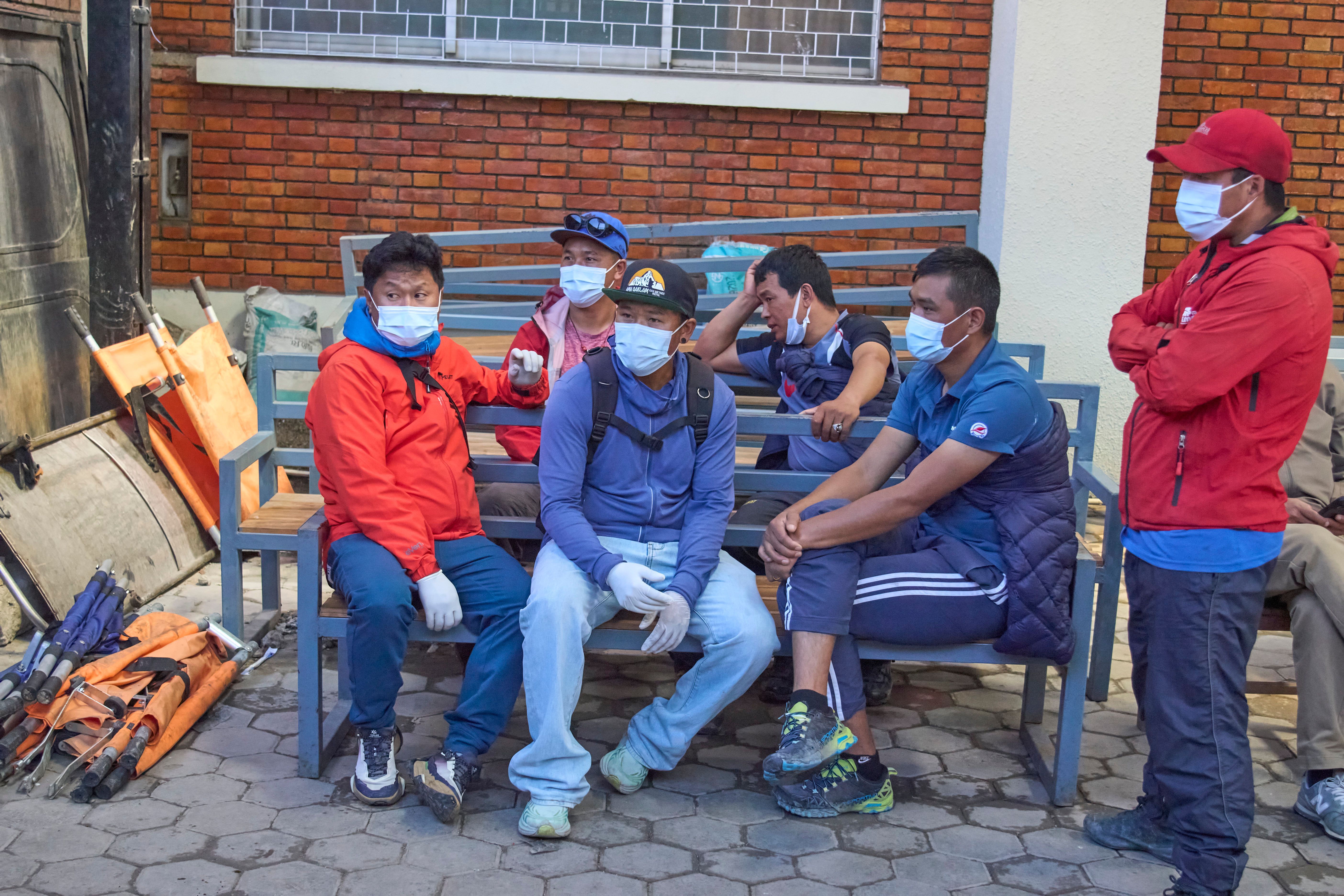 Rescue teams search Nepal mountain for 12 swept by avalanche