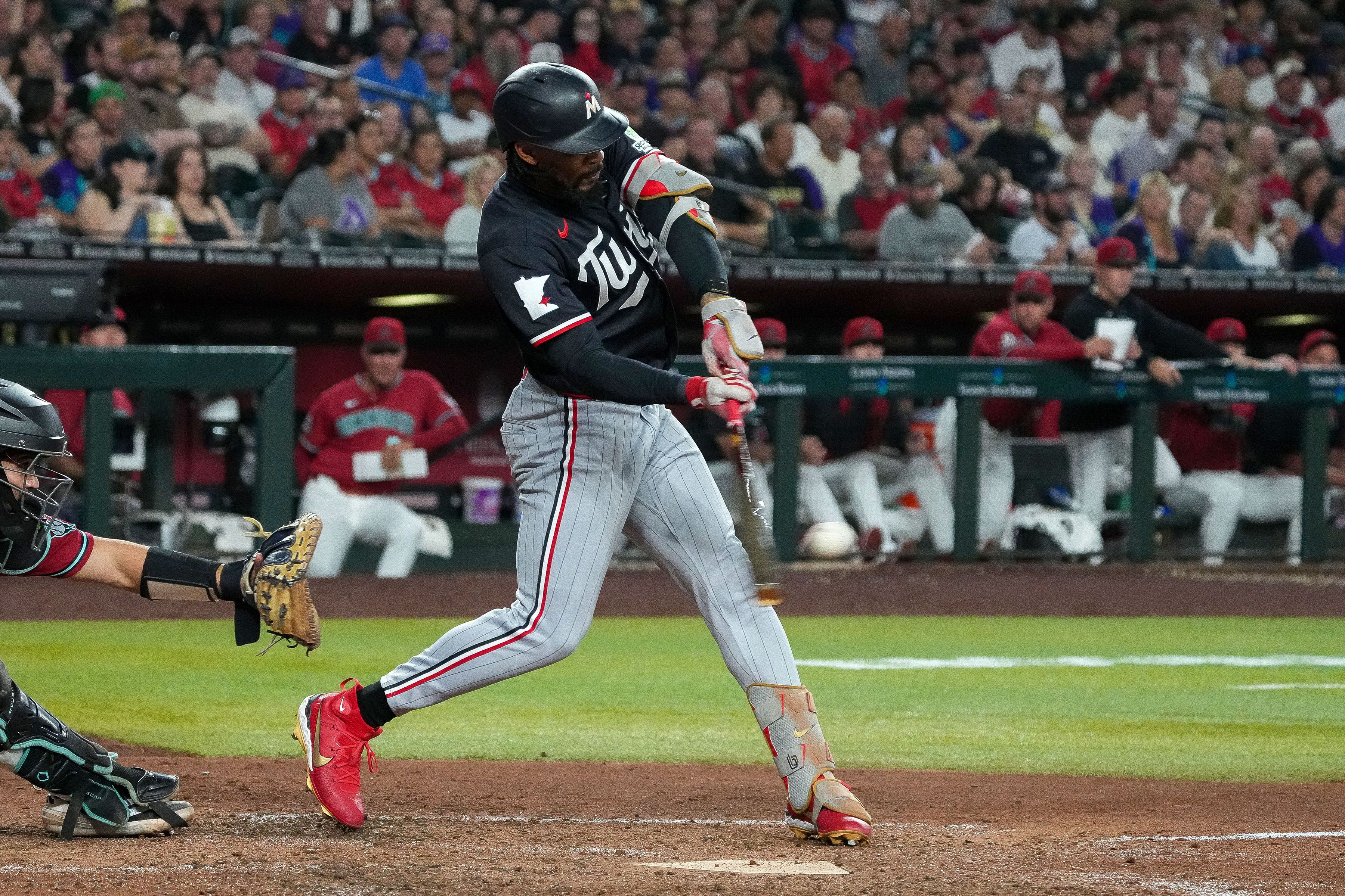 Buxton hits grand slam in 10 - run inning , Twins rout Diamondbacks 16 - 8