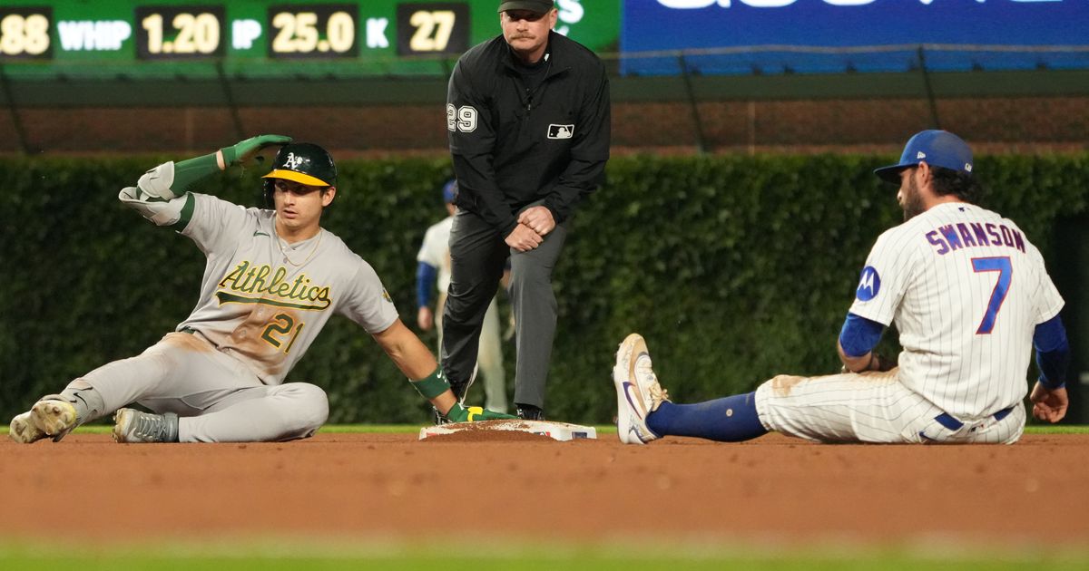 Kurtz drives in winning run in 10th as A's beat Cubs 5-4; Chicago's Happ reaches 1,000 career hits