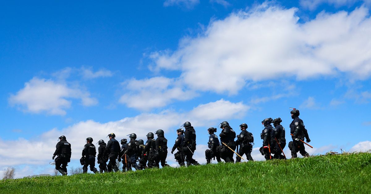 Wisconsin authorities put total arrests from clashes at beagle breeding facility at about 25