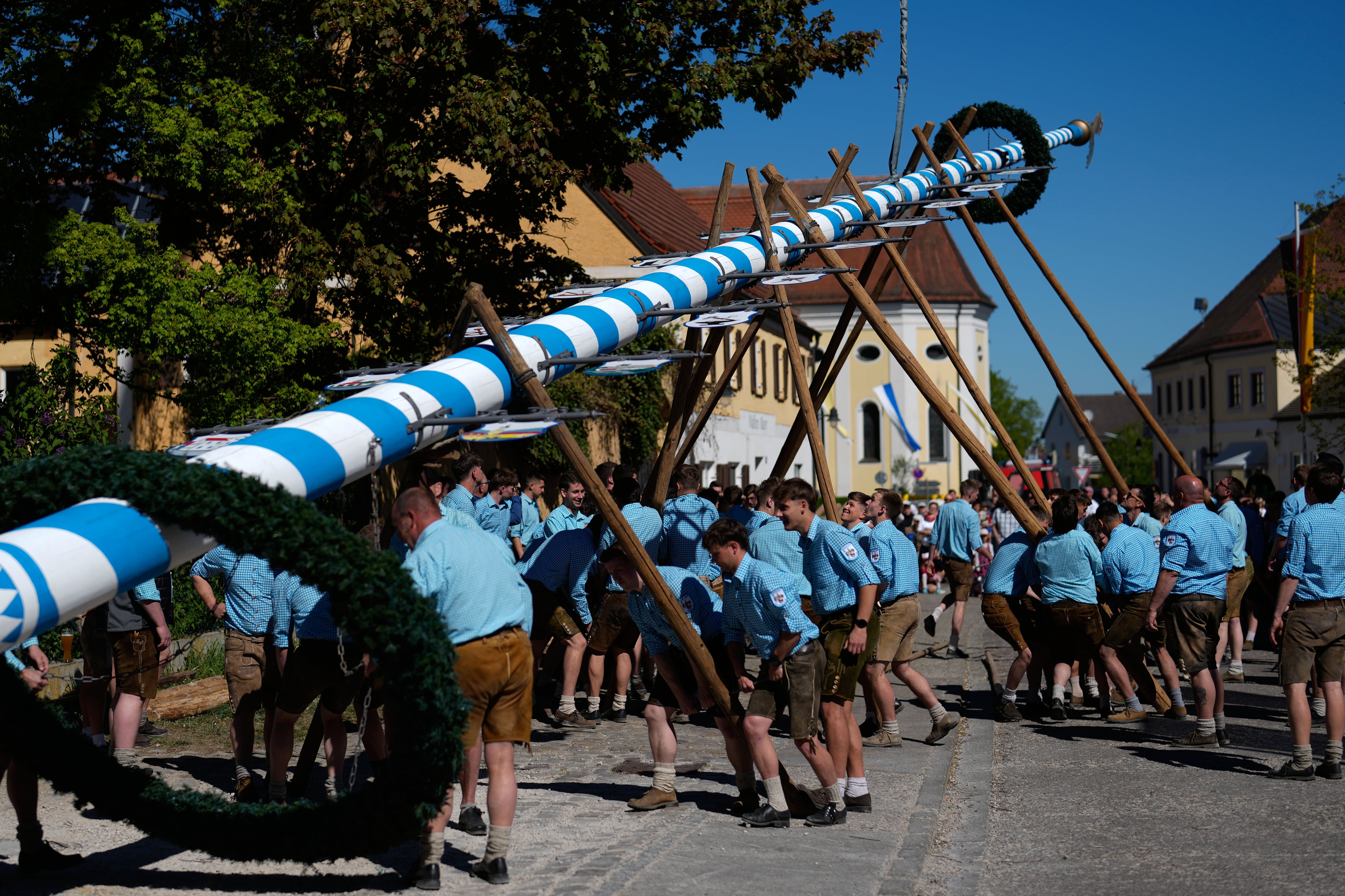 wral.com - KIRSTEN GRIESHABER — Associated Press - Beer, music and shouts of 'Hau-Ruck' as a Bavarian village raises its new maypole
