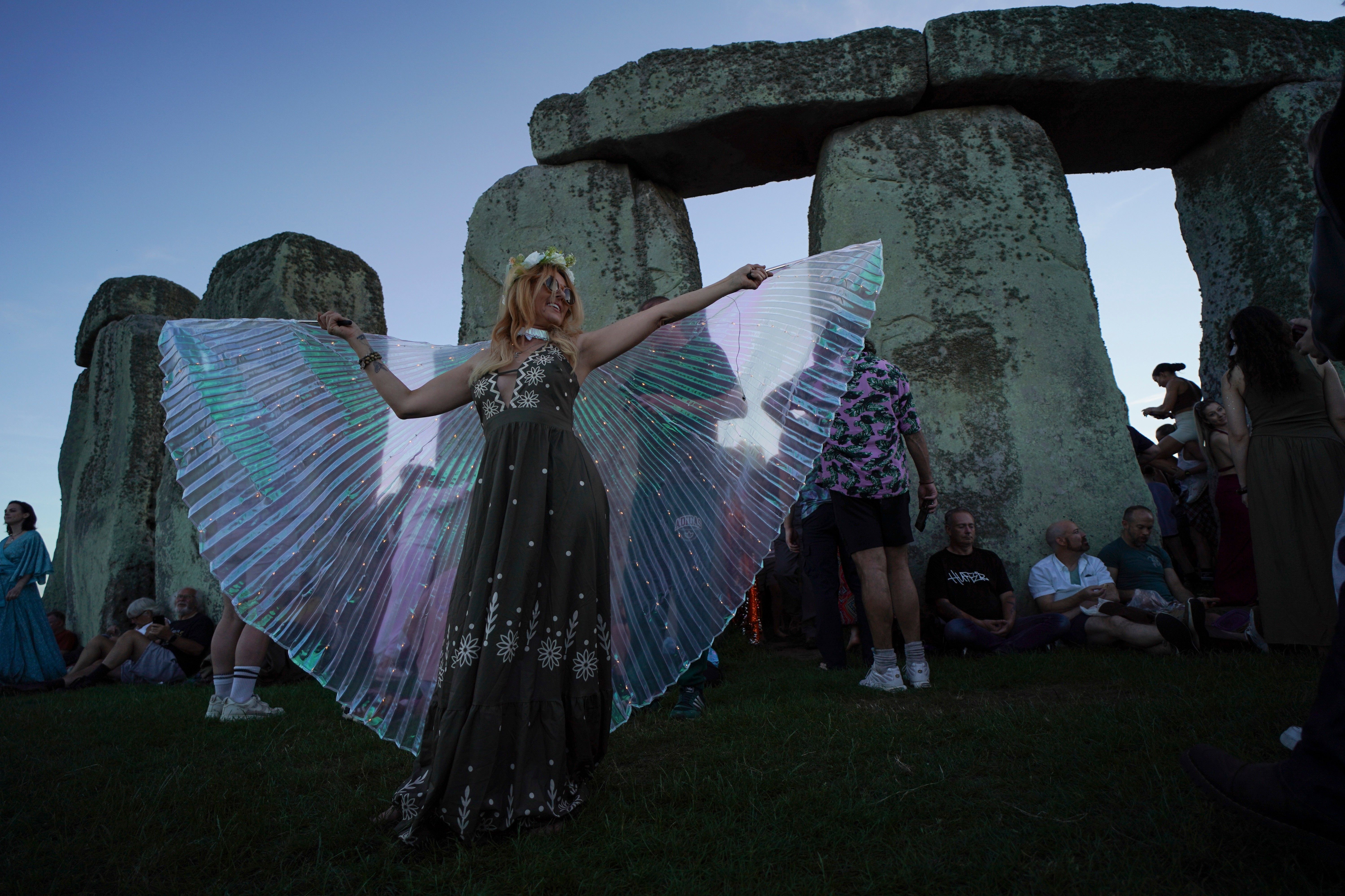 Welcoming the longest day at Stonehenge , in photos
