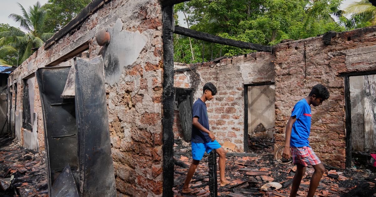 Survivors from a burned Sri Lankan nursing home relocate, in photos