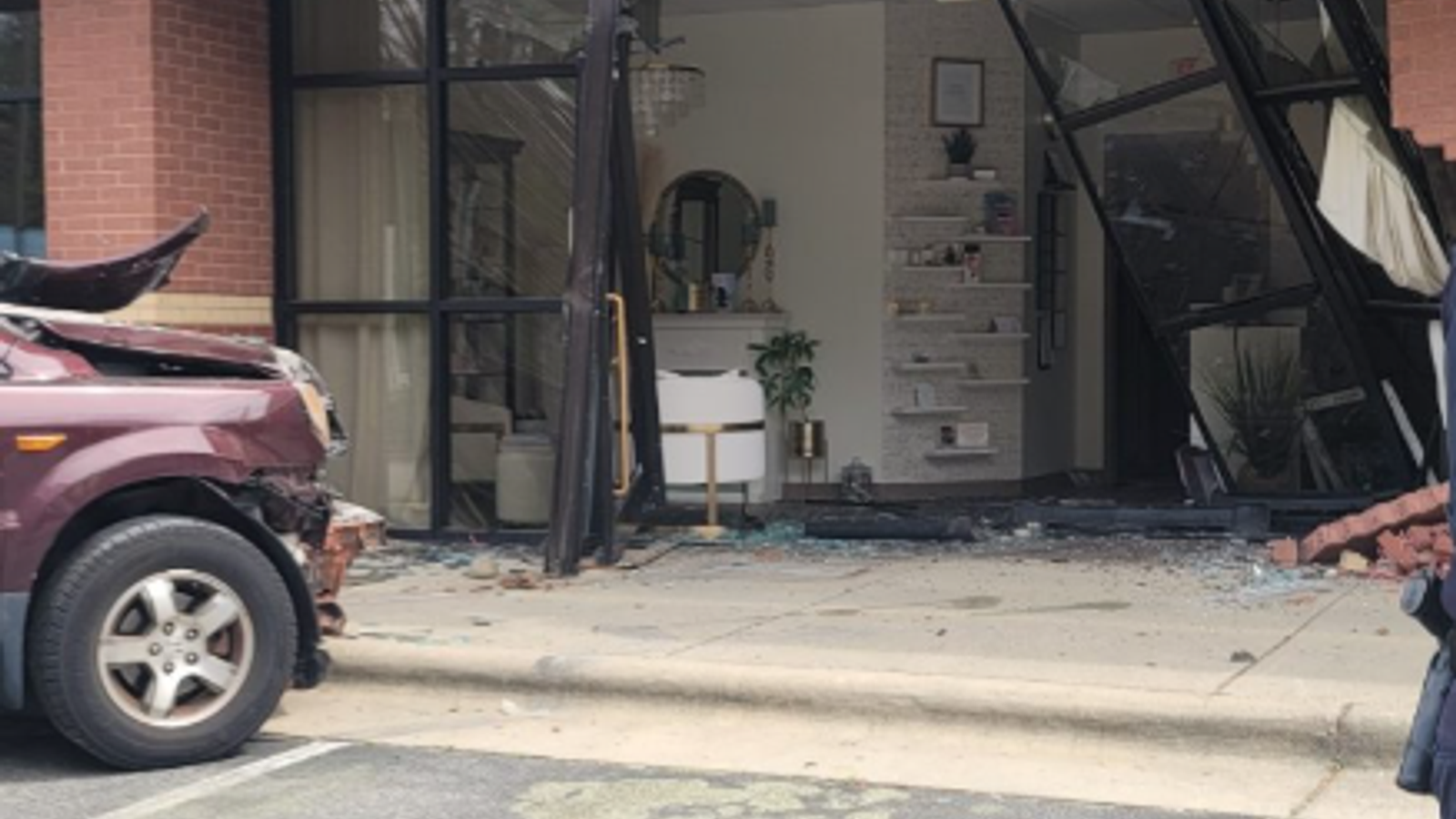 Driver crashes into Garner business