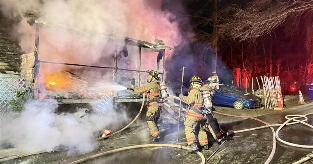 Two dogs rescued, firefighter injured in Durham house fire