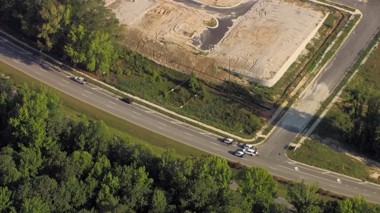 New Bern Ave shut down at Old Milburnie Road; police on scene