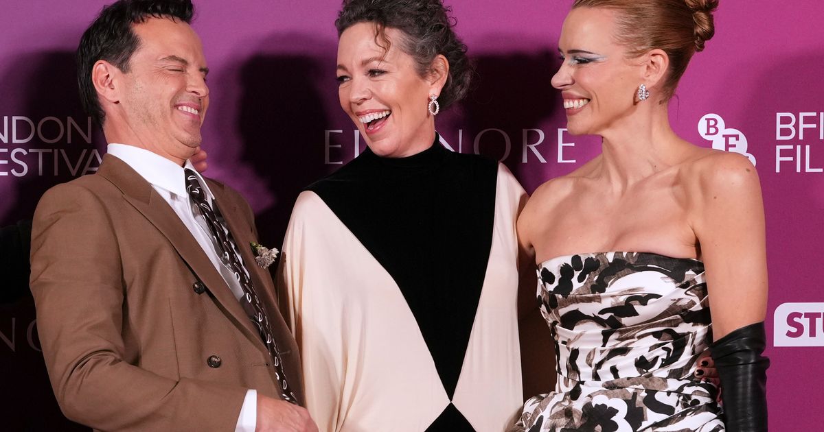 Andrew Scott, from left, Olivia Colman, and Billie Piper pose for photographers upon arrival at the premiere for the film