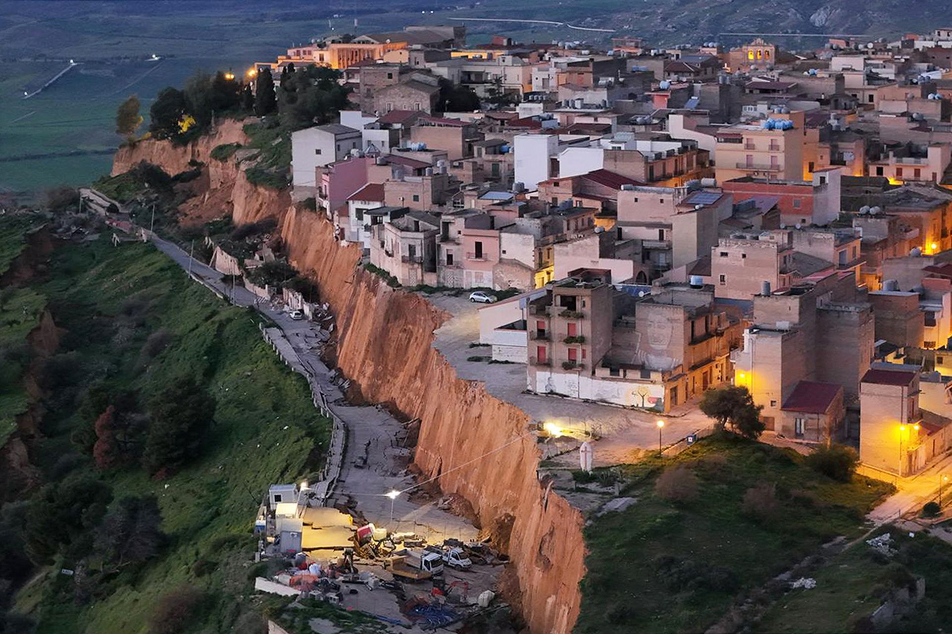 Huge landslide cleaves off the edge of a town in Sicily and forces the  evacuation of 1,500 people :: WRAL.com