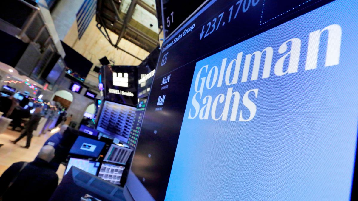 FILE - In this Dec. 13, 2016, file photo, the logo for Goldman Sachs appears above a trading post on the floor of the New York Stock Exchange. (AP Photo/Richard Drew, File)