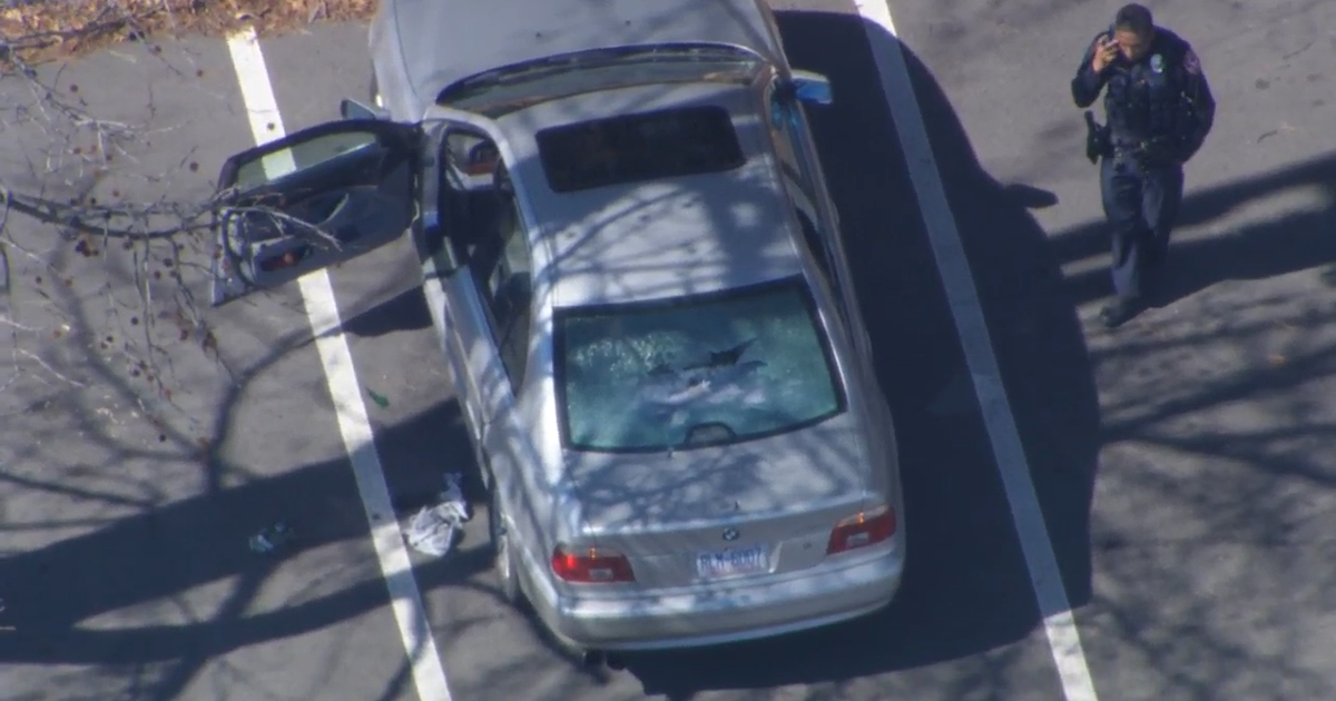 Authorities investigate car with bullet holes parked in lot of Durham business