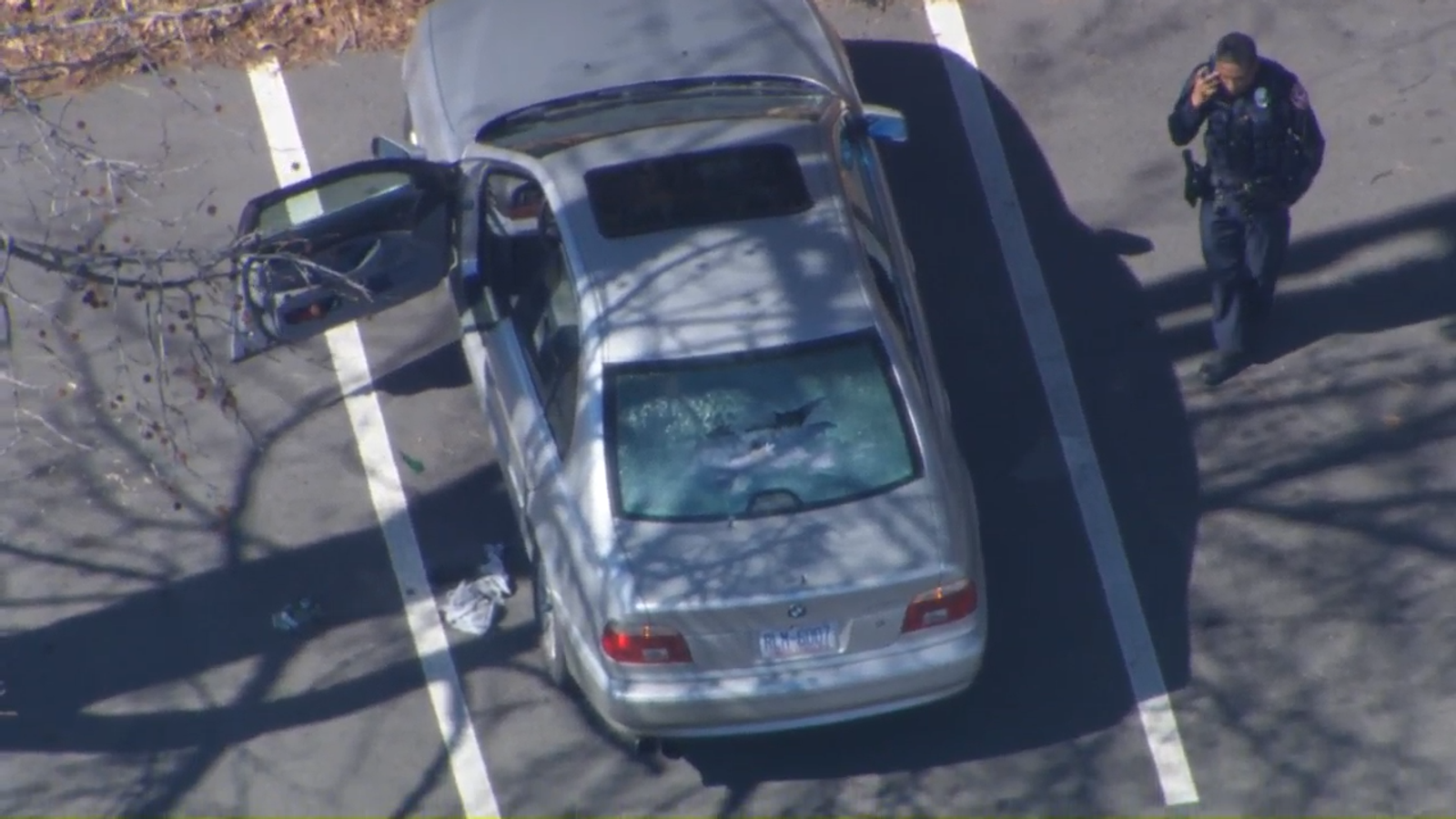 Authorities investigate car with bullet holes parked in lot of Durham business