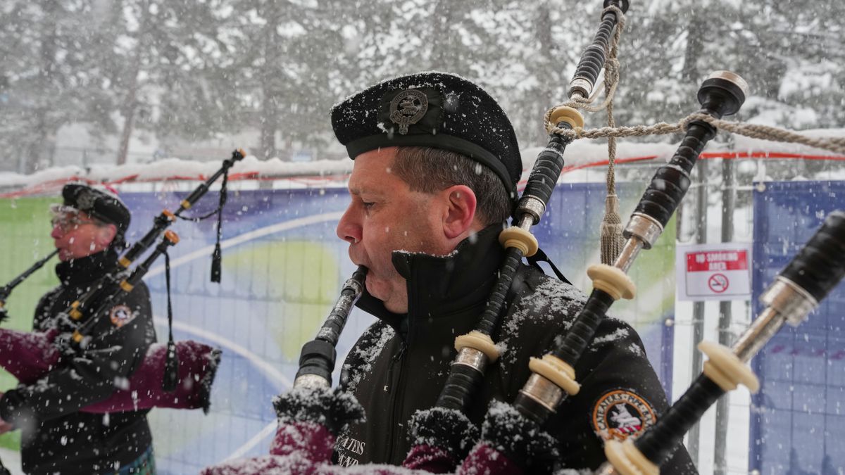 Italian bagpipers practice outside the curling stadium, at the 2026 Winter Olympics, in Cortina d'Ampezzo, Italy, Thursday, Feb. 19, 2026. (AP Photo/Misper Apawu)