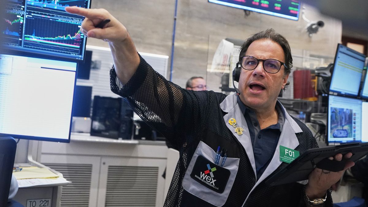 Options trader Anthony Spina works on the floor of the New York Stock Exchange, Wednesday, Nov. 12, 2025. (AP Photo/Richard Drew)