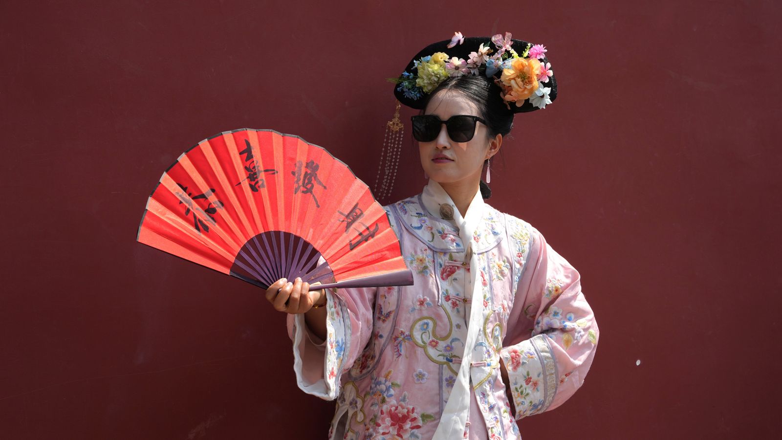 Dressing visitors in ancient China's imperial splendor is booming in  Beijing :: WRAL.com