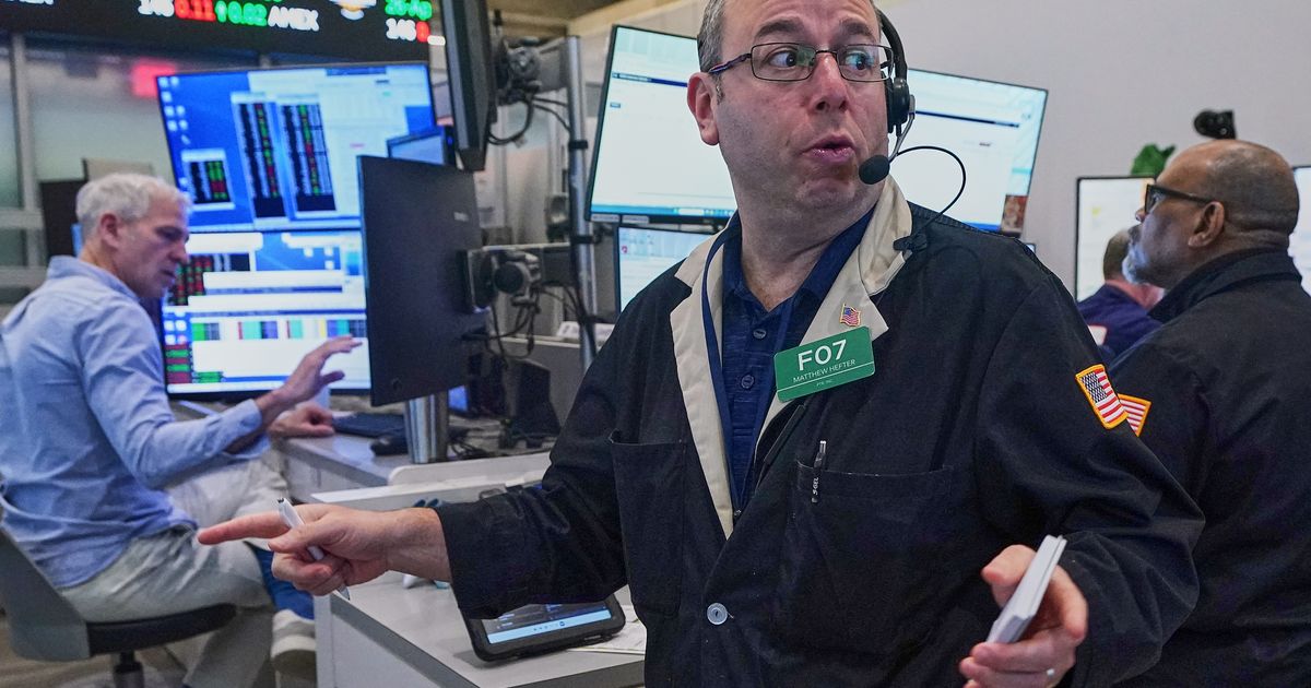 Asian shares are mixed and oil gains $2 as Iran talks remain in flux