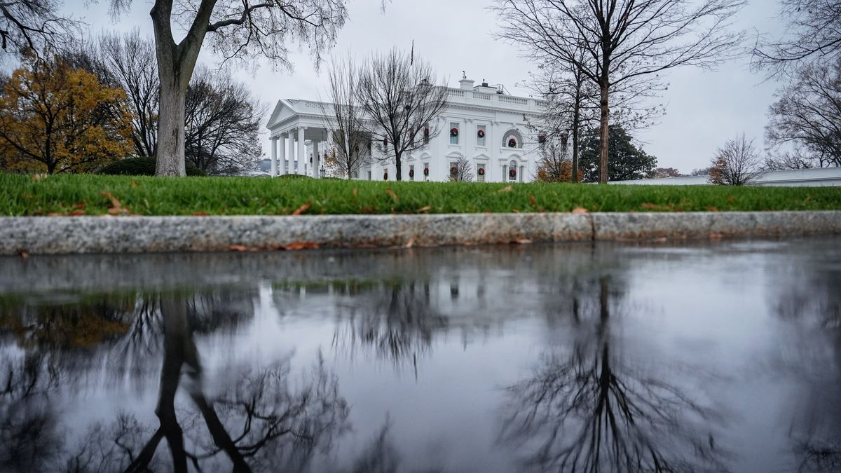 FILE - The White House is reflected in a puddle, Dec. 2, 2025, in Washington. (AP Photo/Julia Demaree Nikhinson, File)