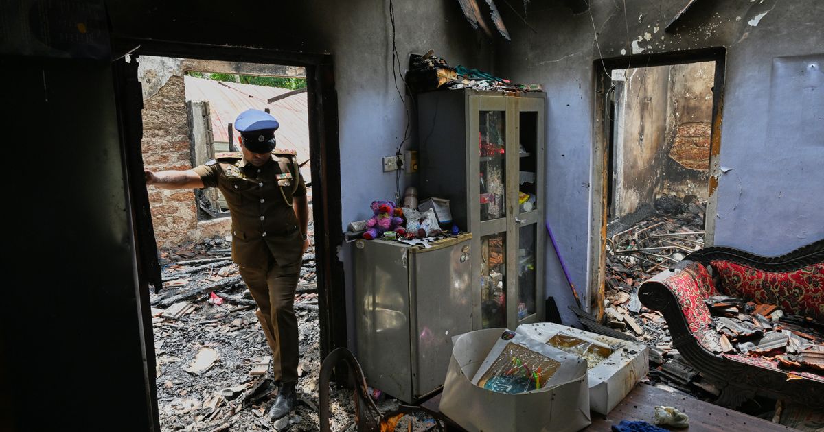 Sri Lanka nursing home worker says a ‘chained’ patient was among 13 fire victims