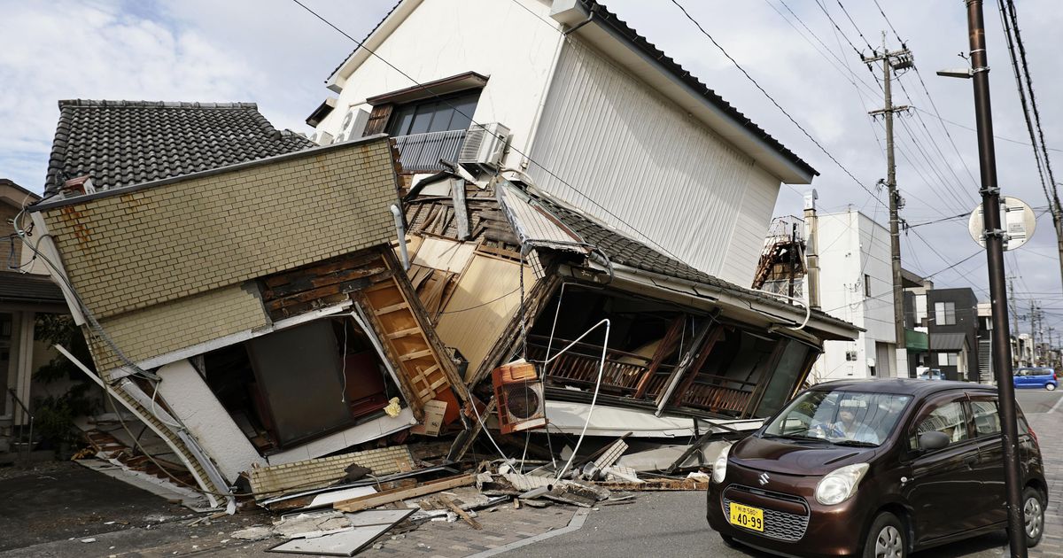 Rescuers search for survivors after a 7.1 quake kills 18 in southwestern Japan