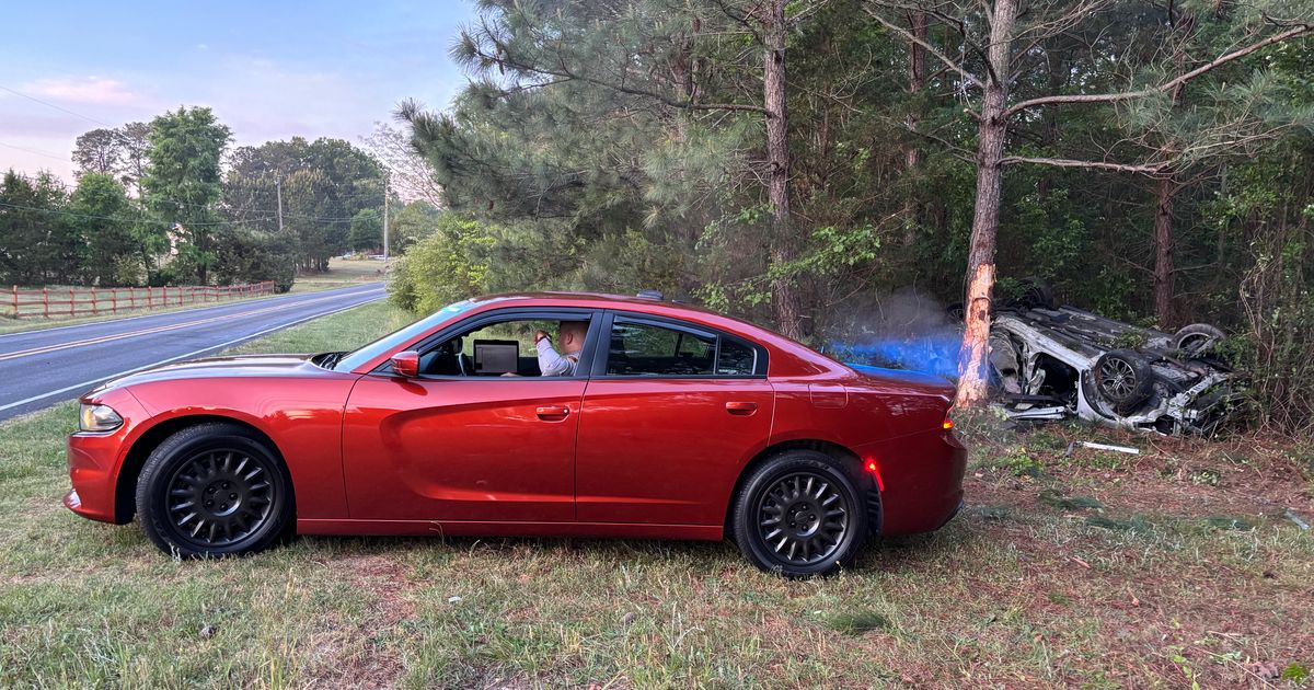 Crews rescue driver trapped inside car that flipped near Zebulon