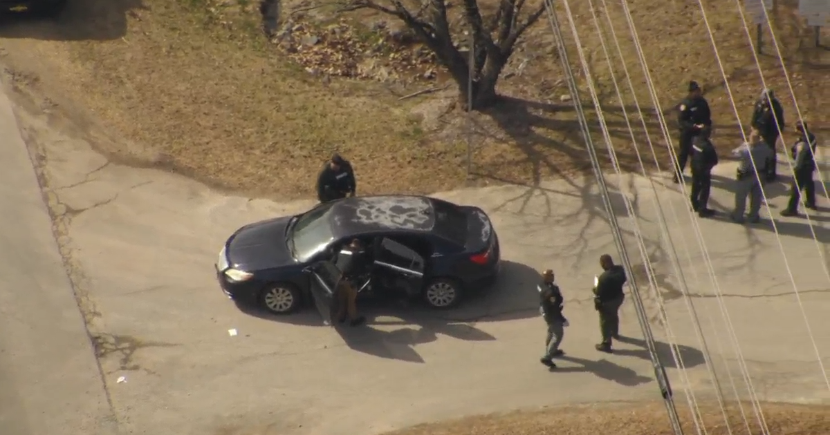 Law enforcement investigate car parked at entrance of Durham County Sheriff's Department
