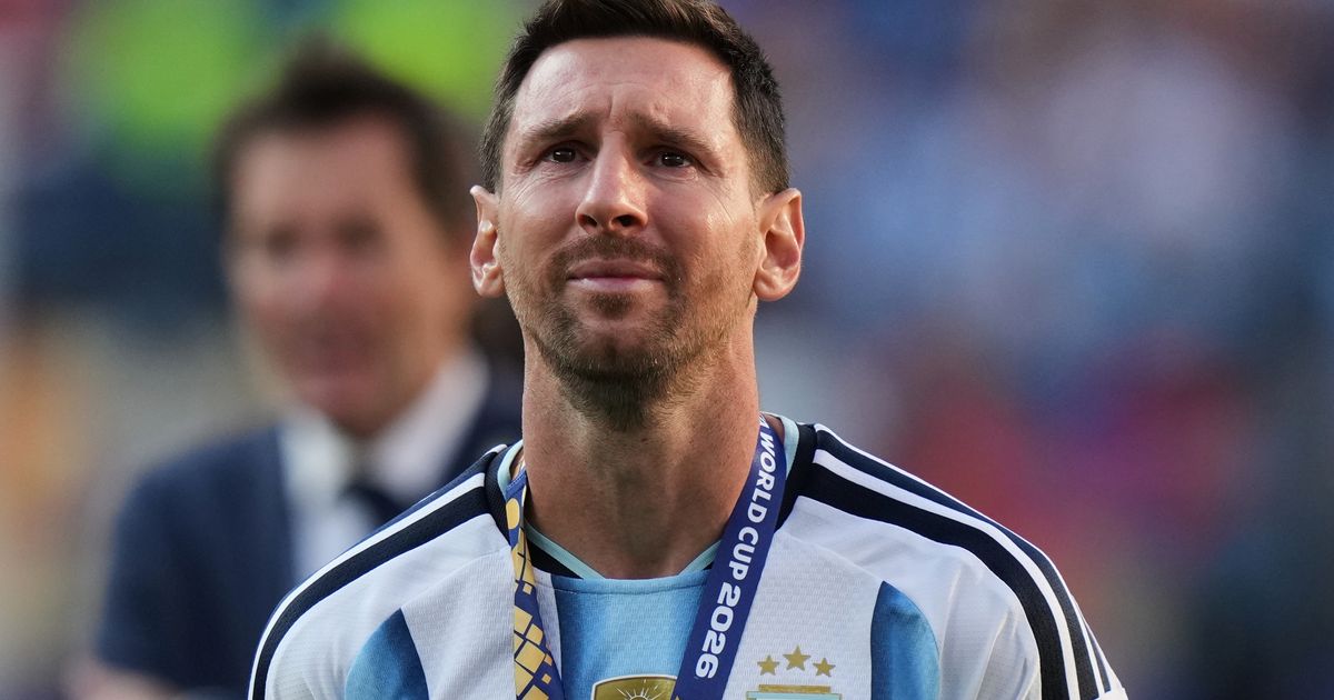 FILE - Argentina's Lionel Messi cries at the end of the World Cup final soccer match with Spain in East Rutherford, N.J